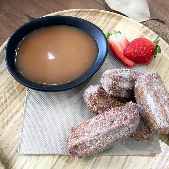 Chocolate churros with chocolate and salted caramel sauce